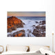 California, Malibu, Sunset over rocky ocean coastline Wall Mural