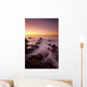 California, Malibu, Sunset over rocky ocean coastline Wall Mural
