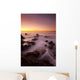 California, Malibu, Sunset over rocky ocean coastline Wall Mural