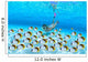 Woman snorkeler near sandy bottom, Butterflyfish school foreground Wall Mural