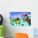 Over/under woman snorkeler face to face with Butterflyfish school Wall Mural