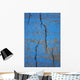 Close Up Of Cracks On A Blue Painted Asphalt Surface Wall Mural