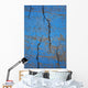 Close Up Of Cracks On A Blue Painted Asphalt Surface Wall Mural