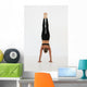 A woman doing a handstand Wall Mural