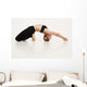 A woman in a yoga pose;Tarifa cadiz andalusia spain Wall Mural
