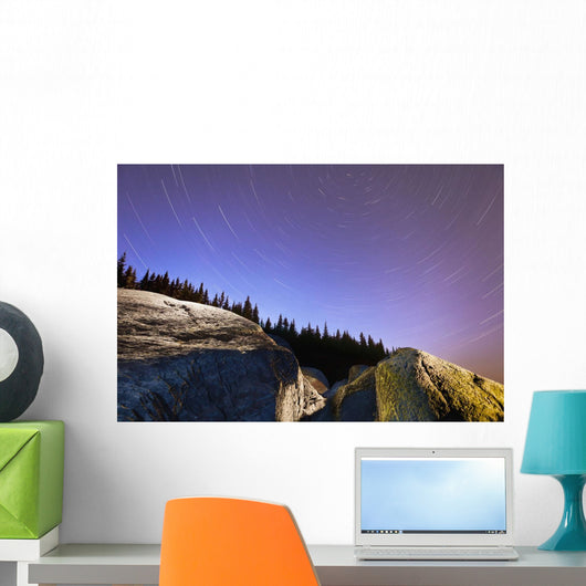 Star Trails Over Rocks In Saguenay-St Lawrence Marine Park Wall Mural