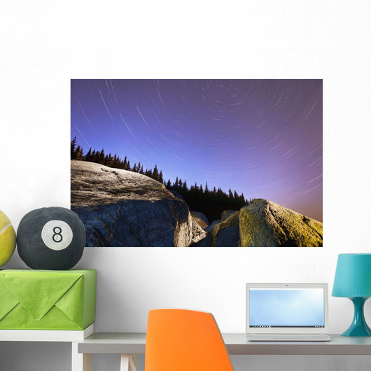 Star Trails Over Rocks In Saguenay-St Lawrence Marine Park Wall Mural