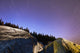 Star Trails Over Rocks In Saguenay-St Lawrence Marine Park Wall Mural