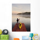 Man Standing By Kayak On Dock In Northwestern Ontario Wall Mural