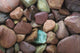 Close-Up Pattern Of River Rocks Alaska Wall Mural