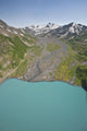 Aerial Of Glacial Moraine Feeding Into Lake Wall Mural