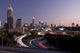 Atlanta skyline just before sunset with traffic streaks Wall Mural