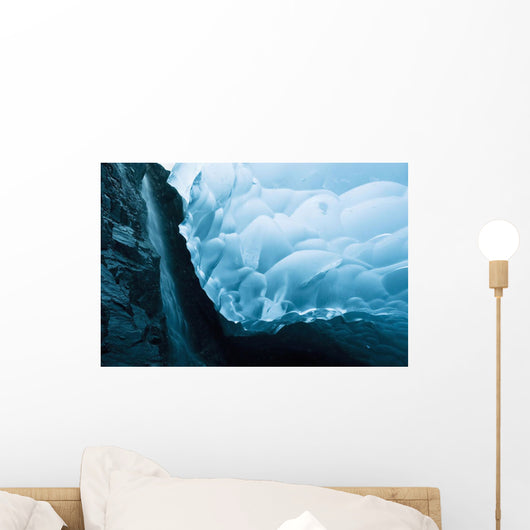 A Waterfall Down An Ice Cave Glacier Wall Mural