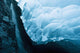 A Waterfall Down An Ice Cave Glacier Wall Mural