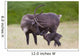 A Day Old Reindeer Calf Is Nuzzled By Its Mother In A Grassy Field Wall Mural