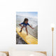 A young girl on a yellow surfboard;Gold coast queensland australia Wall Mural