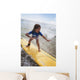 A young girl on a yellow surfboard;Gold coast queensland australia Wall Mural