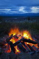 Close-Up View Of A Camp Fire With A View Of The Chugach Mountain Wall Mural