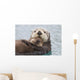 Female Sea Otter Holding Newborn Pup Out Of Water Wall Mural