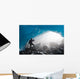 A Hiker Takes Photo Of The Entrance Of An Ice Cave Wall Mural