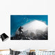 A Hiker Takes Photo Of The Entrance Of An Ice Cave Wall Mural