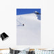 Backcountry Snowboarder Carving Turns Down A Steep Mountain Face Wall Mural