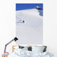 Backcountry Snowboarder Carving Turns Down A Steep Mountain Face Wall Mural