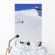 Backcountry Snowboarder Carving Turns Down A Steep Mountain Face Wall Mural