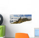 A Snowboarder Takes A Moment To Enjoy The View While Heliskiing Wall Mural