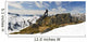 A Snowboarder Takes A Moment To Enjoy The View While Heliskiing Wall Mural