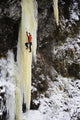 Woman Ice Climber Ascends A Large Icefall In Southcentral Alaska Wall Mural