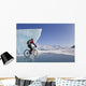 Woman Fat Tire Mountain Biking On Ice At The Knik Glacier Wall Mural