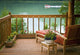 View Of The Deck And Chair With Floatplane Landing On Big River Lake Wall Mural