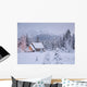 Snowcovered Home In A Wintry Meadow At Dawn With Inside Lights On Wall Mural