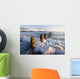 Surf Rushing Around Old Pilings Wall Mural