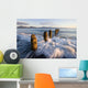 Surf Rushing Around Old Pilings Wall Mural