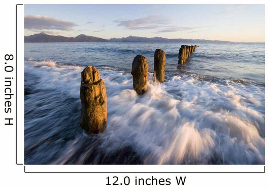 Surf Rushing Around Old Pilings Wall Mural