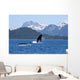 A Humpback Whale Calf Breaches As Its Mother Swims Wall Mural