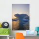Sunset Beyond Ice Sculpture Of A Whales Tail Wall Mural