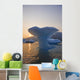 Sunset Beyond Ice Sculpture Of A Whales Tail Wall Mural