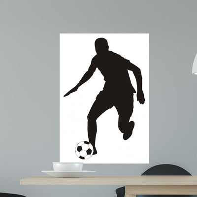 Footballsoccer shown on a wall