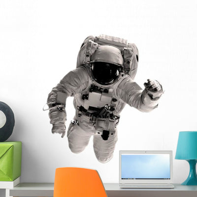 Floating Astronaut Wall Decal shown on a wall