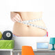 Woman Measuring Her Belly Wall Mural