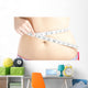 Woman Measuring Her Belly Wall Mural
