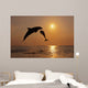Pair Of Bottle Nose Dolphins Jumping At Sunset Wall Mural