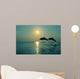 Pair Of Bottle Nose Dolphins Jumping At Sunset Wall Mural