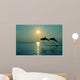 Pair Of Bottle Nose Dolphins Jumping At Sunset Wall Mural