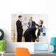 Business people drinking water at water cooler Wall Mural