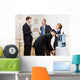Business people drinking water at water cooler Wall Mural