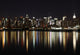 Midtown (West Side) Manhattan at night (panoramic photo made of Wall Mural